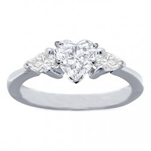 7. Heart Set Pear Engagement Ring