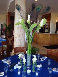 7.  A Simple And Different Peacock Feather Centerpiece