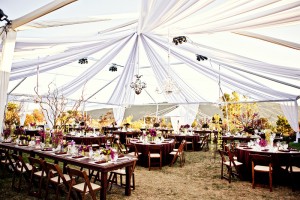 chandeliers-hanging-from-tent-outdoor-wedding-reception